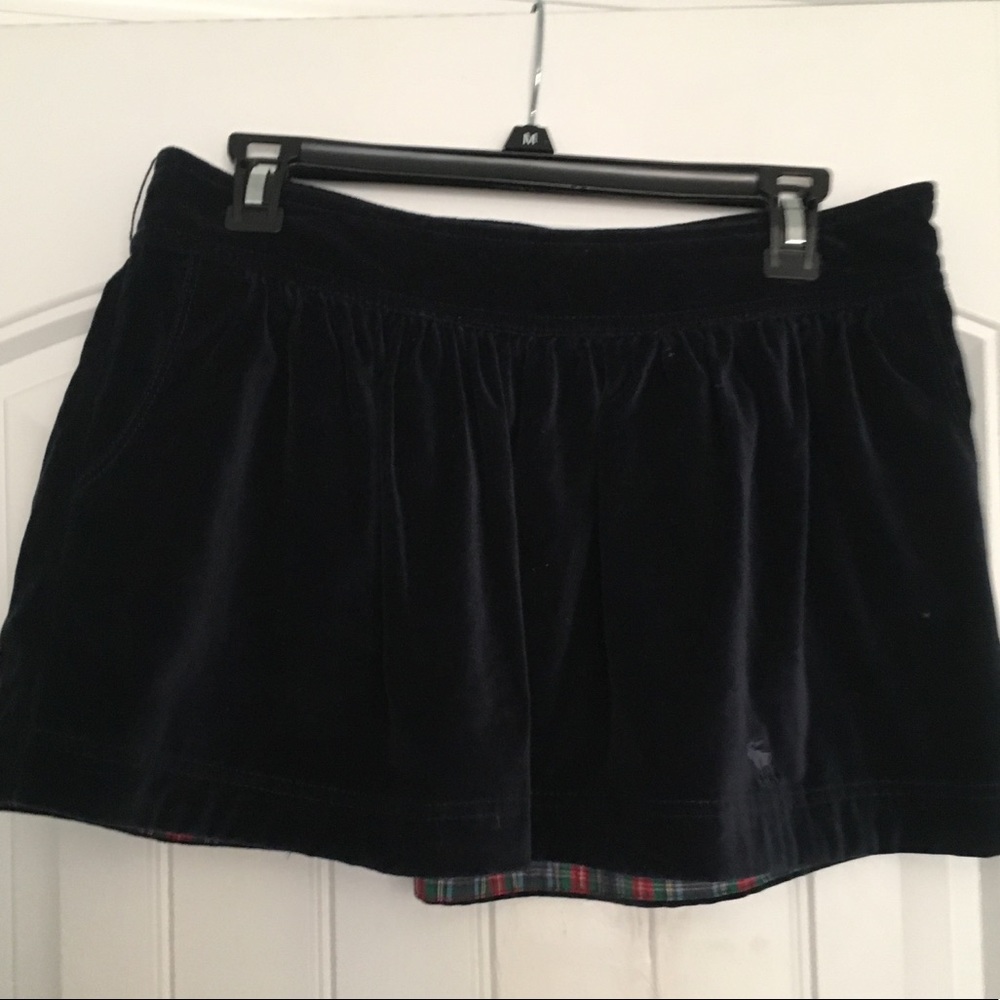 Dark blue velvet skirt.